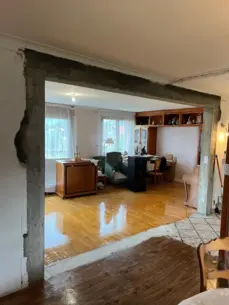 Ouverture d'un mur porteur avec linteau béton lissé pour joindre deux pièces.

Dimension : 1600 × 1200 px